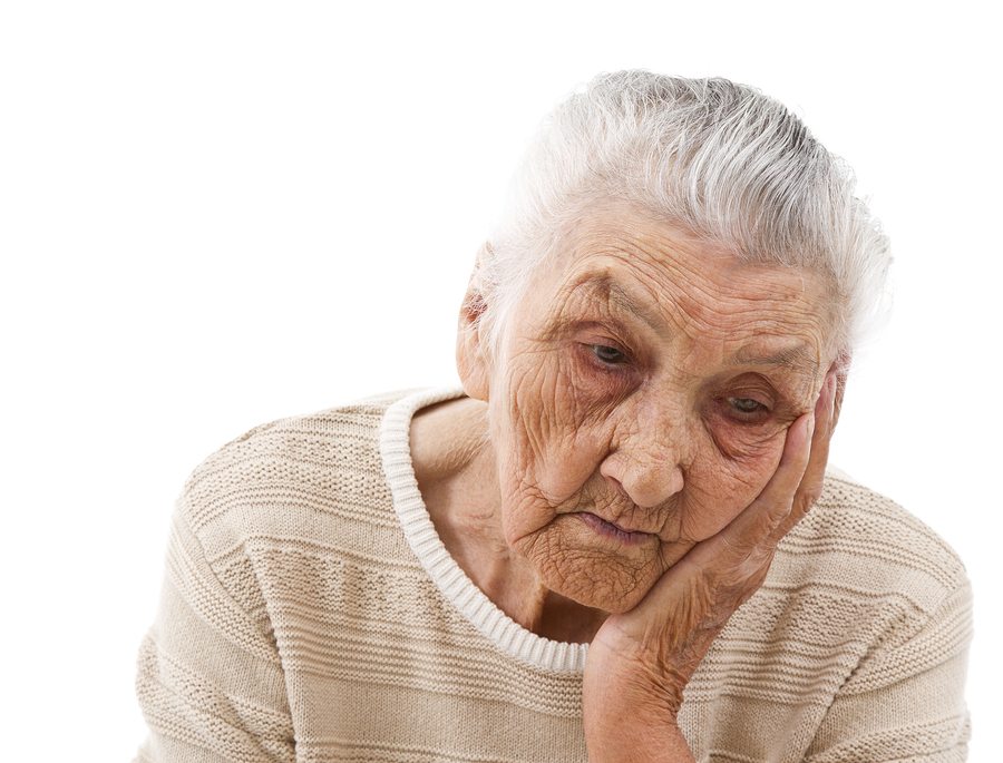 sad elderly woman nursing home abuse