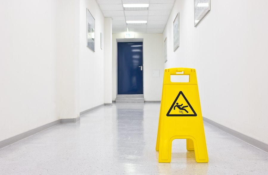 slip and fall accident hallway slippery when wet warning