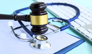 law firm Bethesda MD - Gavel and Stethoscope with Computer Keyboard
