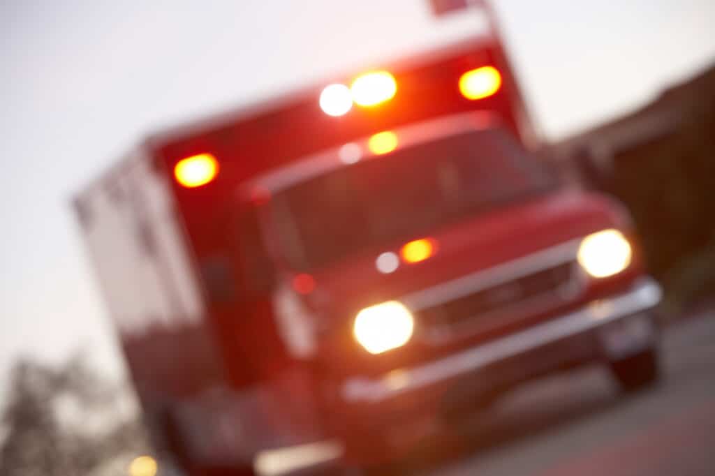 Lightweight Trucks Are Unsafe Too - Defocused shot of ambulance on a city street